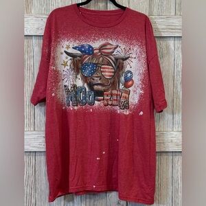 Unbranded women’s tee shirt with adorable cow and red white and blue theme.